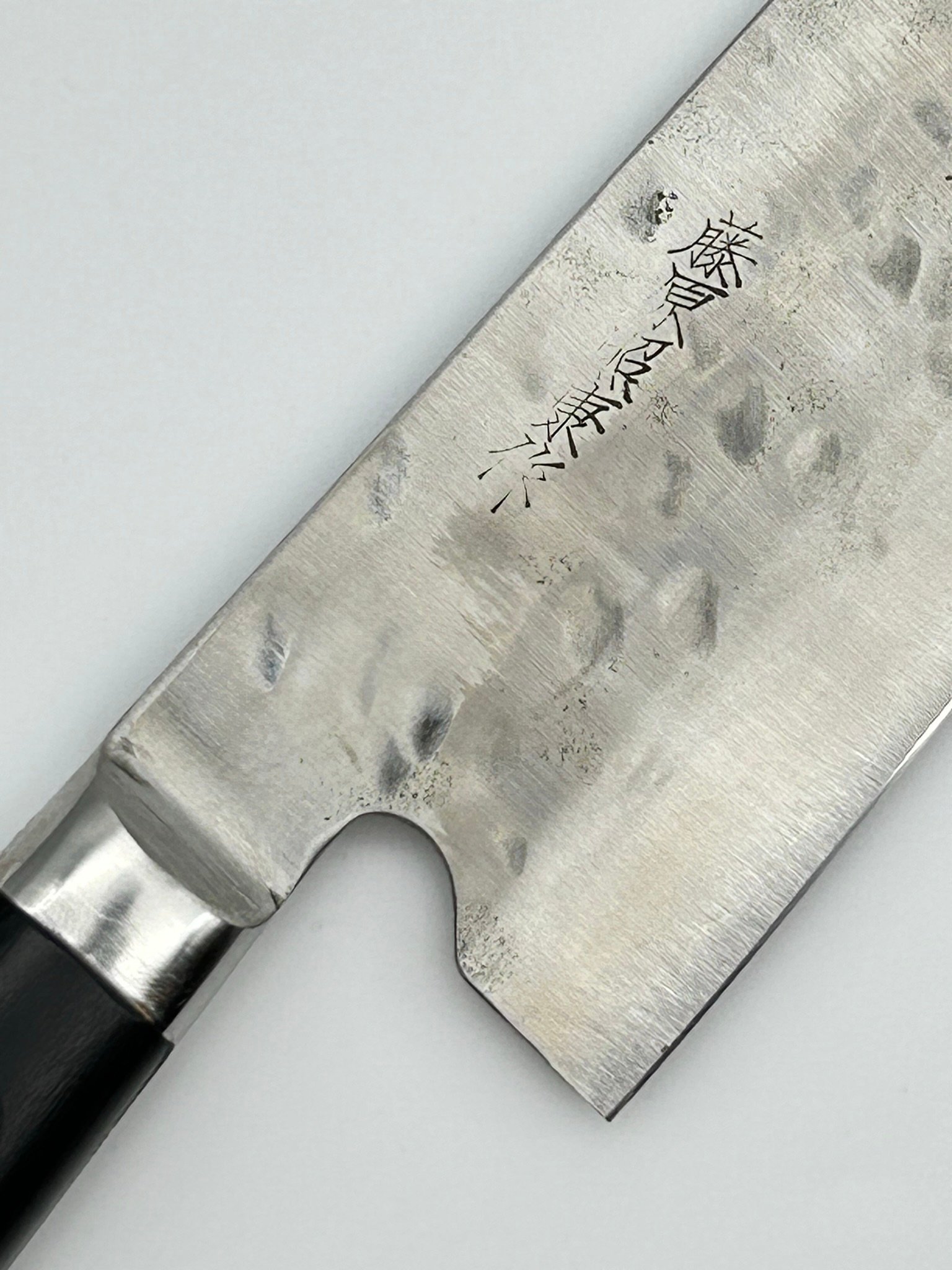 https://acuteangleshop.com/wp-content/uploads/2023/09/teruyasu-fujiwara-maboroshi-shirokami-1-with-stainless-santoku-japanese-knife-180mm-western-handle-05.jpeg